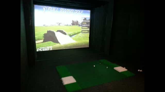 Golf Simulator with Projector in Dark Room